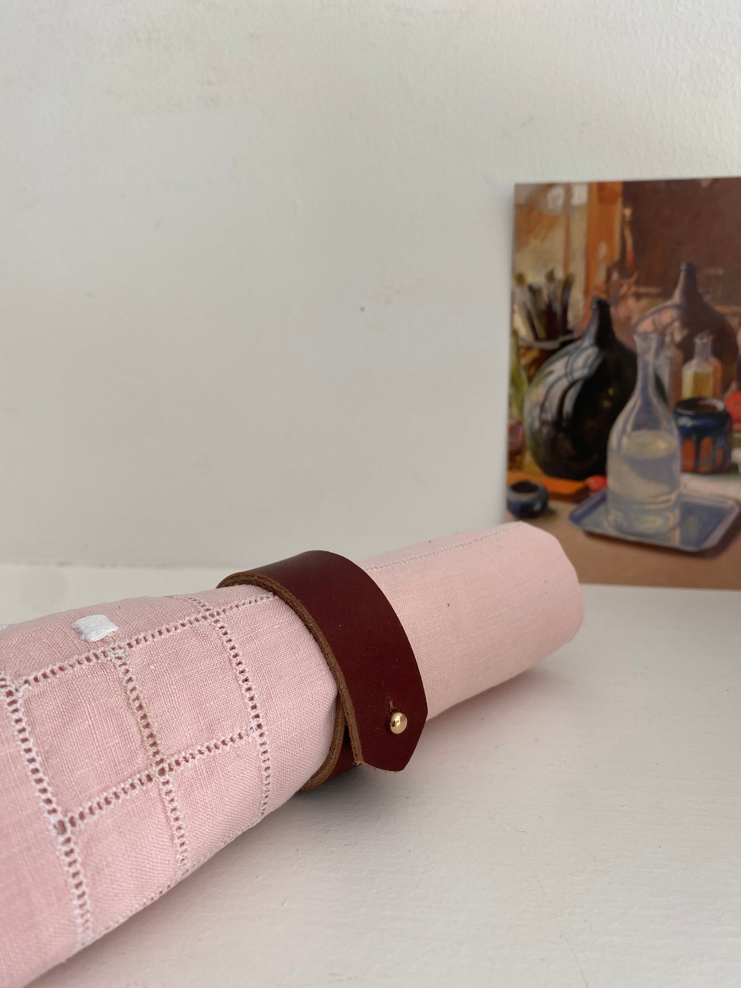 rond de serviette qui s'ouvre en cuir français venant d'une maison de luxe