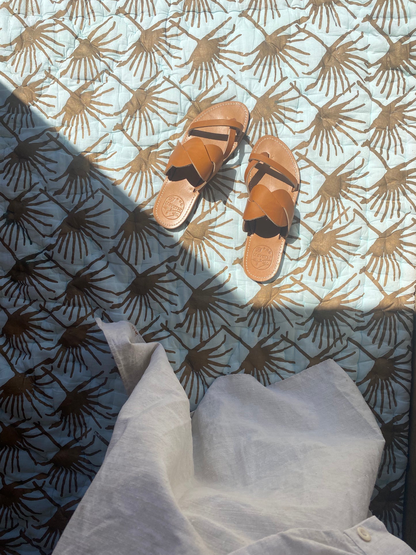 soleil et palmier pour souligner la modèle IDRIS de TRAVERSE ensoleillé
